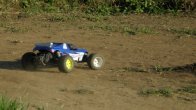 Traxxas Rustler VXL z karoserią Lightning Stadium 10